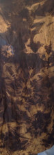 Black to tan discharged fabric